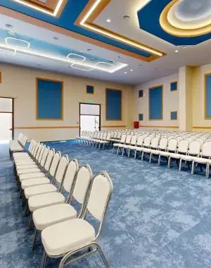 Conference room set up with rows of chairs