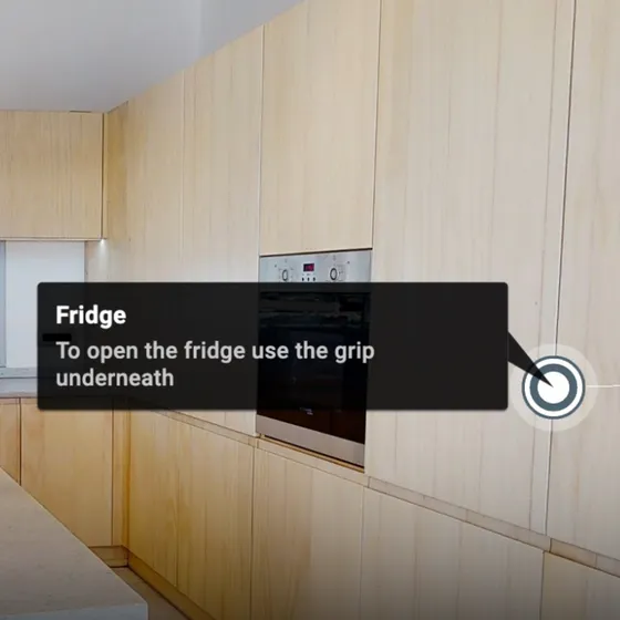 Info point with a note placed on a kitchen appliance in a 3D tour